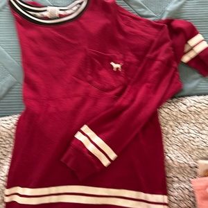 Pink long sleeve shirt. Worn. Still lots of wear.